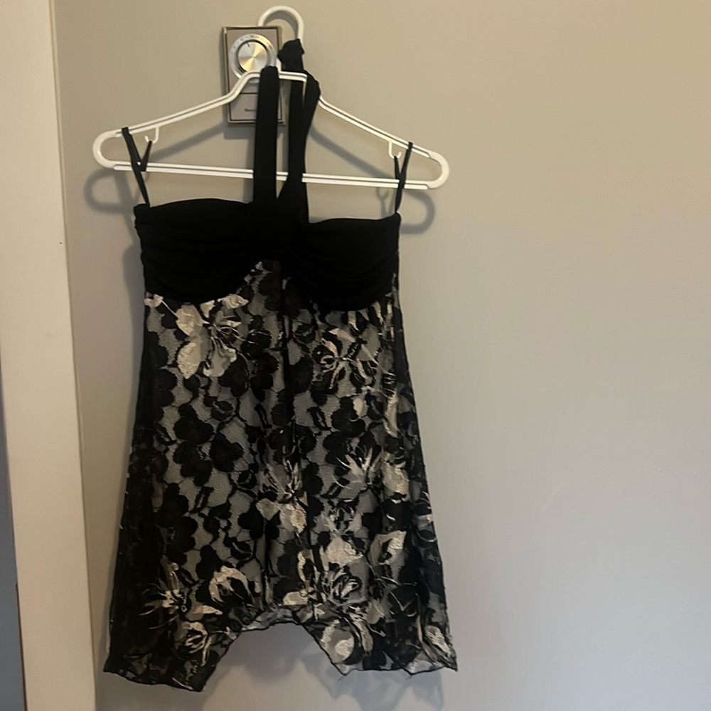 Stylish tie back purchased from Le Chateau, size sm